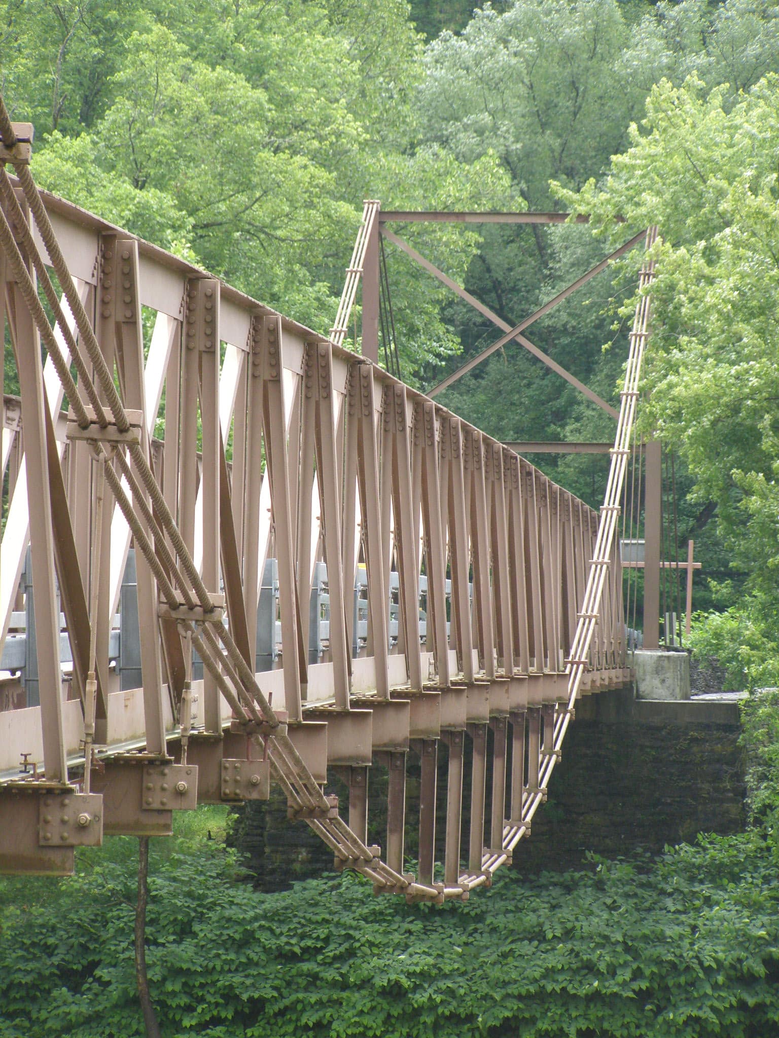 Under-Spanned Suspension Bridges